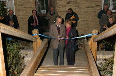 Julia and Hugh Fleming, cutting the ribbon