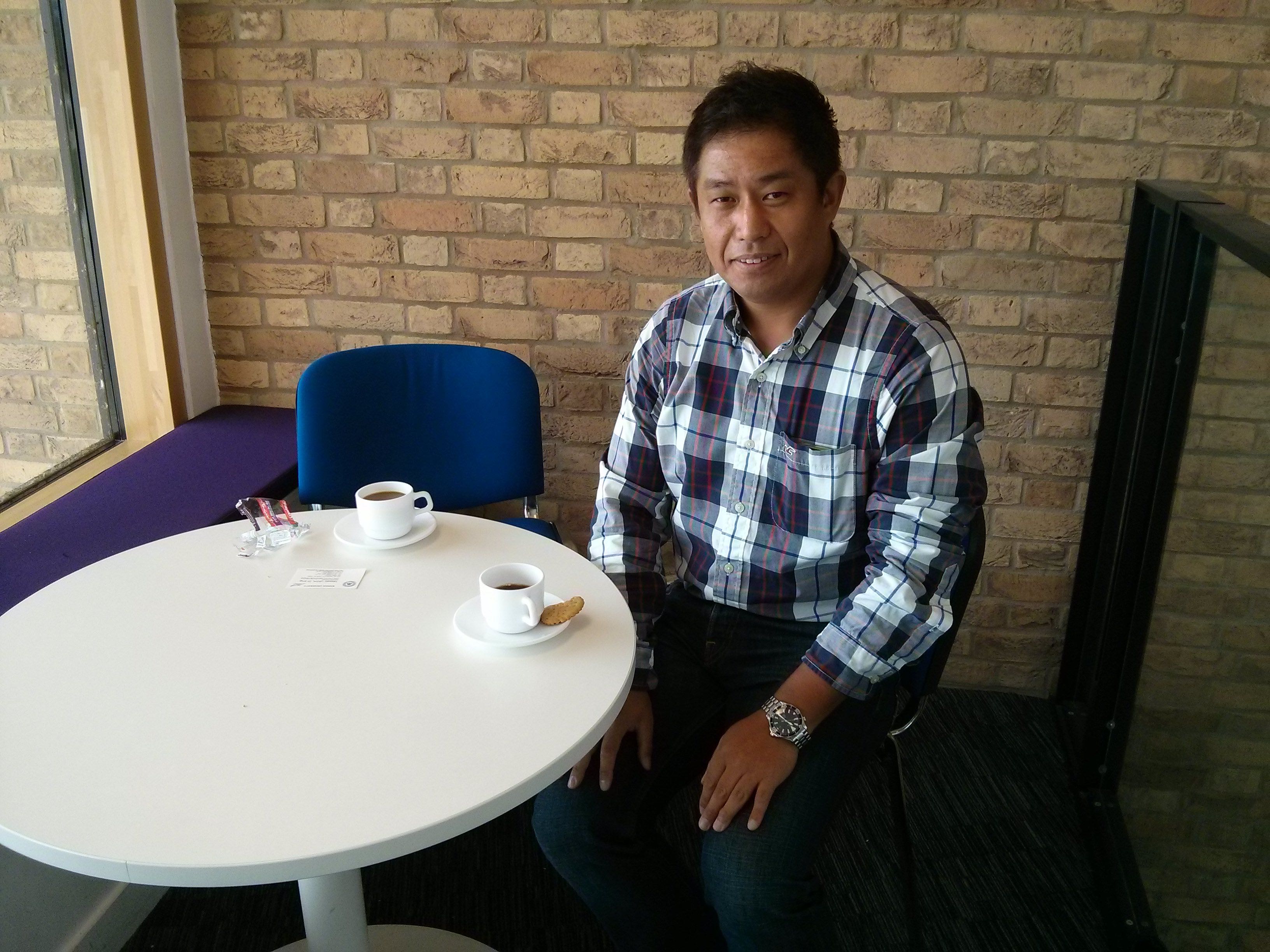 Professor Ueda in Cambridge tea room